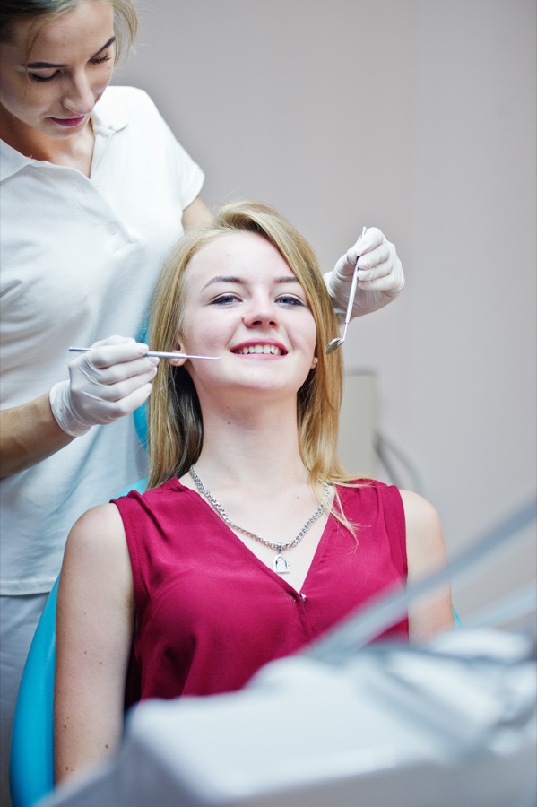 Dentist consulting with patient at Bittern Dental