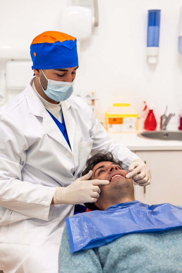 Dentist consulting with patient at Bittern Dental