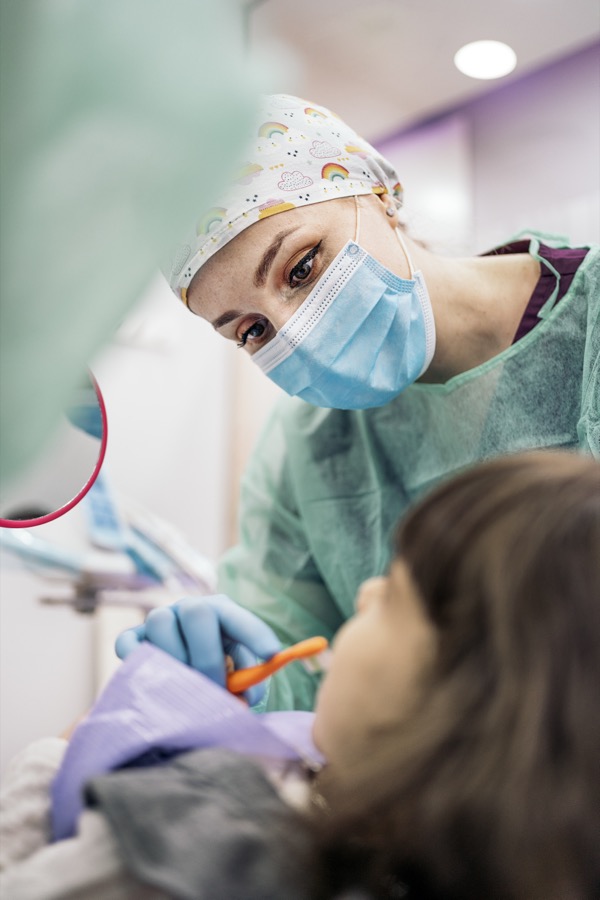 Dentist consulting with patient at Bittern Dental
