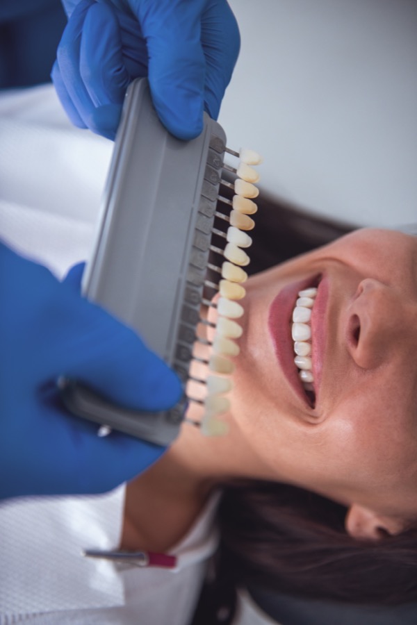 Dentist consulting with patient at Bittern Dental