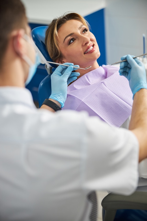Dentist consulting with patient at Bittern Dental