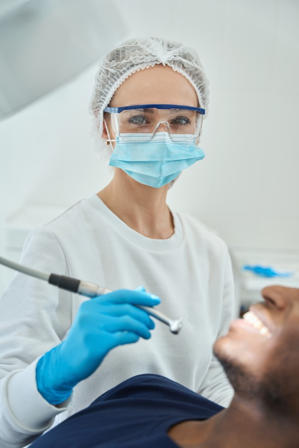 Dentist consulting with patient at Bittern Dental
