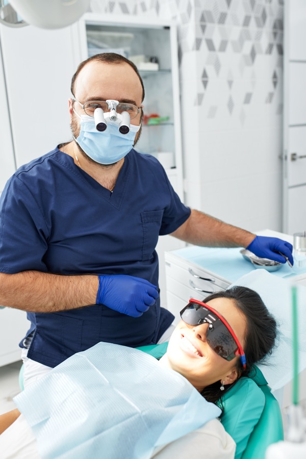 Dentist consulting with patient at Bittern Dental
